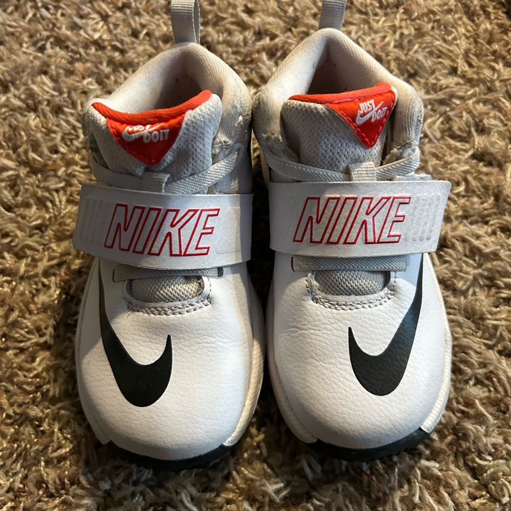 Nike White and Black Sneakers with High-Top Design